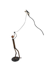 Boy Holding Kite Figurine